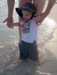 Logan wading in the water